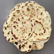 Soft homemade sweet flatbread, perfect for wraps, dips, or as a side, cooked until golden brown