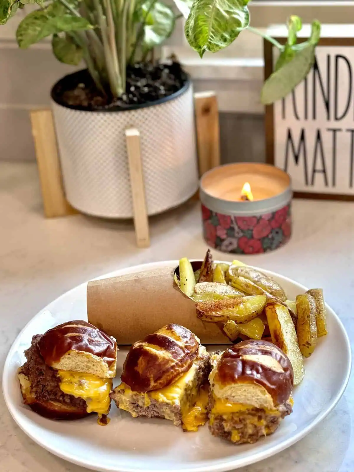 Crispy homemade fries pair perfectly with these juicy cheeseburger sliders.