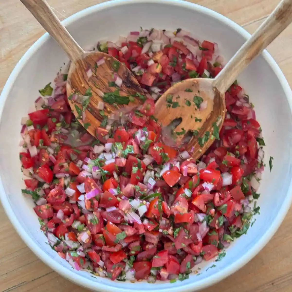 Fresh homemade Pico de Gallo in a white bowl