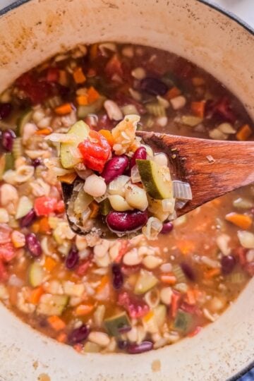 Cozy fall minestrone soup with pasta and beans, perfect for autumn dinners.