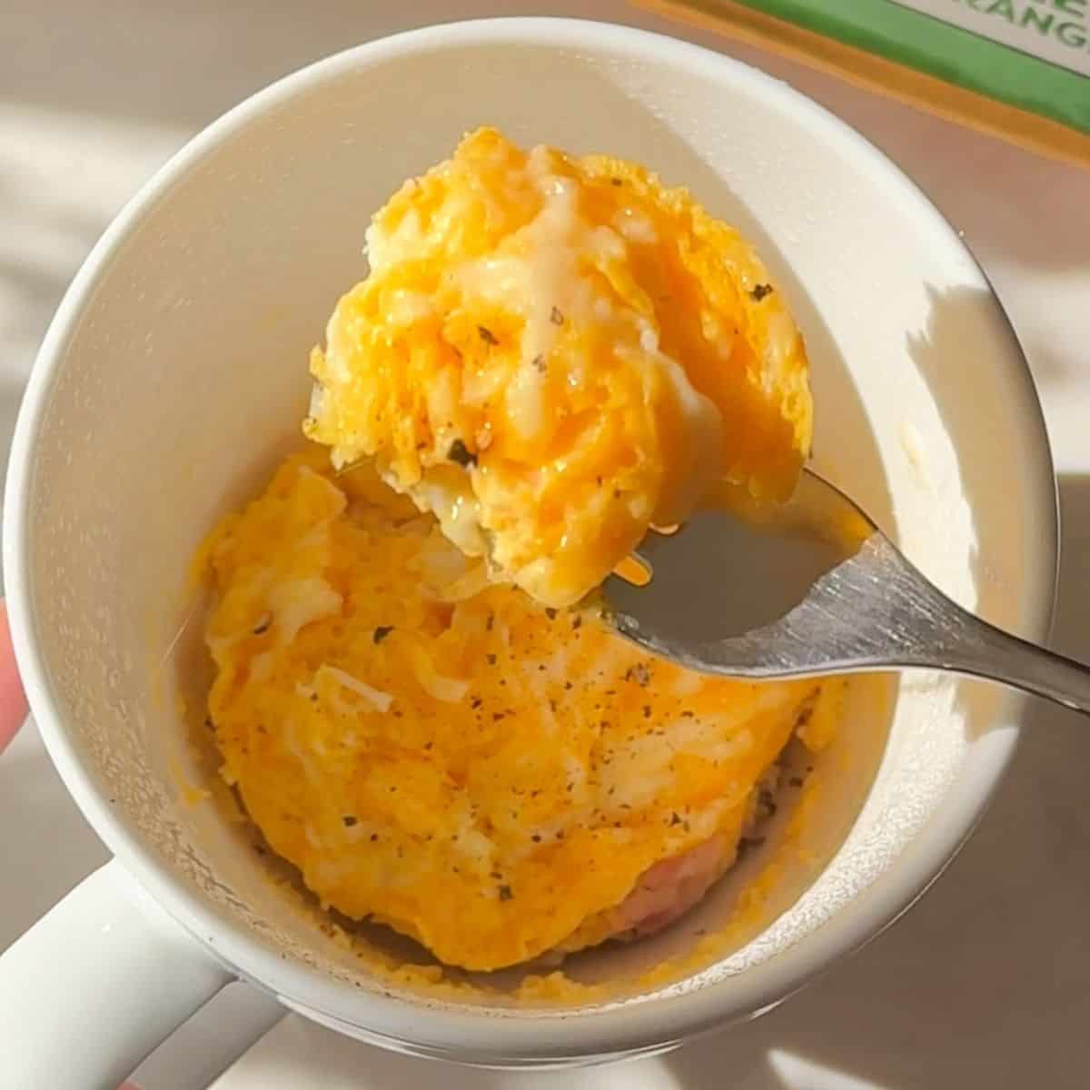 Microwave egg scramble served in a mug, finished and ready to eat