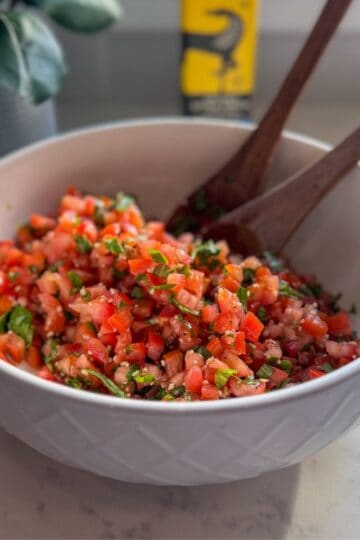 Bowl of tomato bruschetta mix served as a dip.