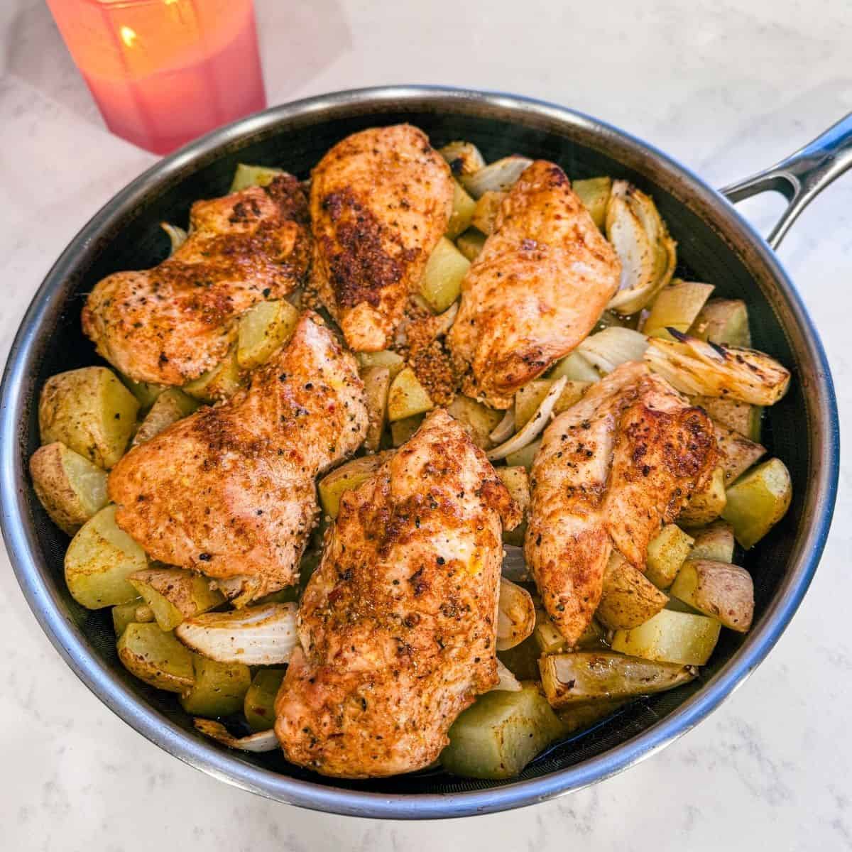 One pan honey Dijon chicken and potatoes cooked and ready to serve