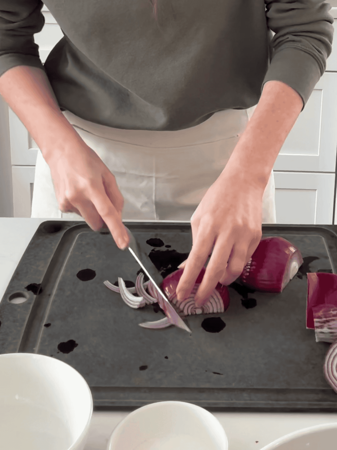 Thinly slicing red onions for quick pickled red onions and cucumbers