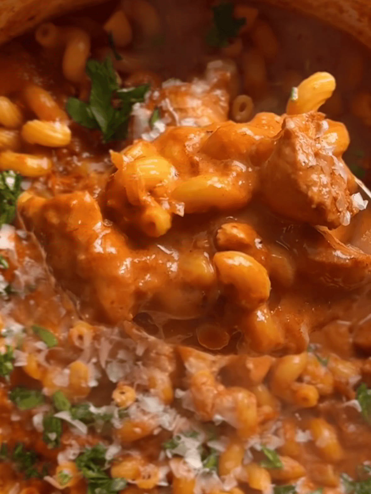 Step 4 creamy tomato chicken pasta spoonful with parmesan and parsley