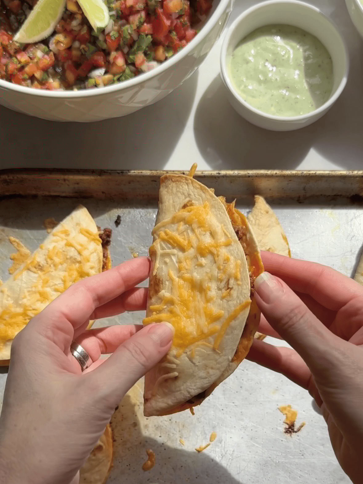 crispy baked tacos on sheet pan fresh out of oven before adding toppings