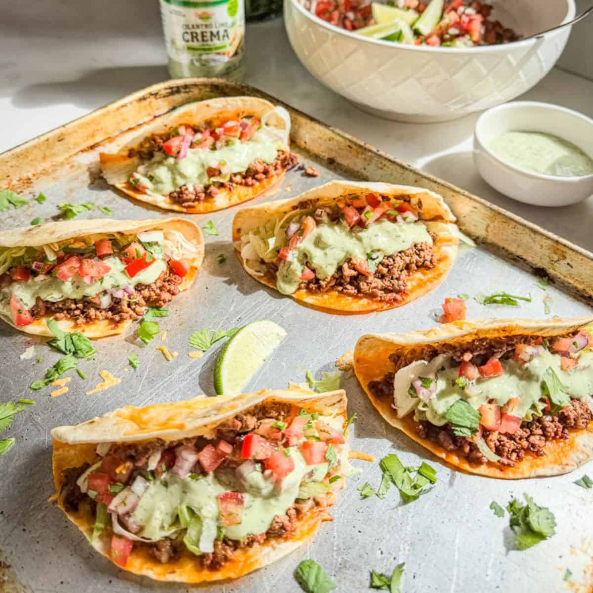 crispy ground beef tacos on sheet pan easy oven baked taco recipe