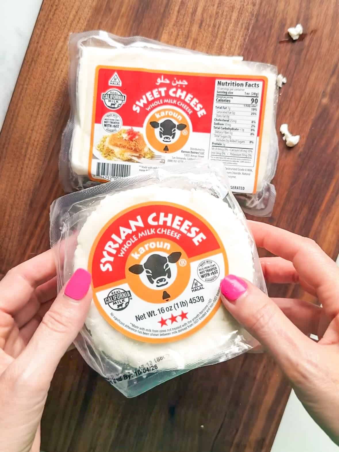 Hands holding a package of Karoun Syrian cheese for phyllo dough with cheese filling