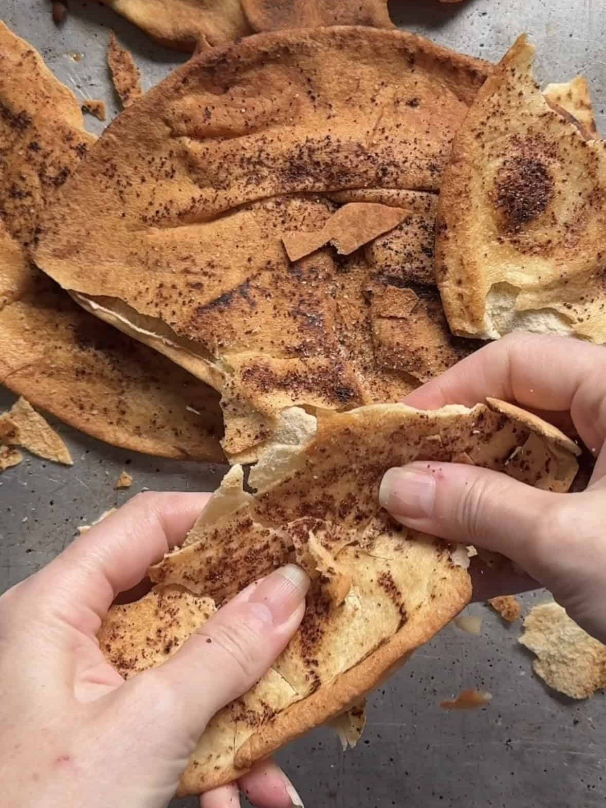 Toasted pita bread seasoned with sumac, torn into pieces for fattoush salad