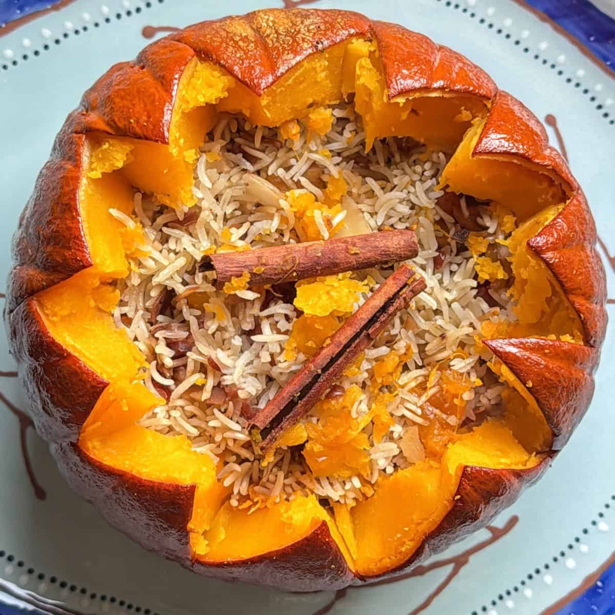 Steam rising from a freshly baked ghapama filled with rice and dried fruit