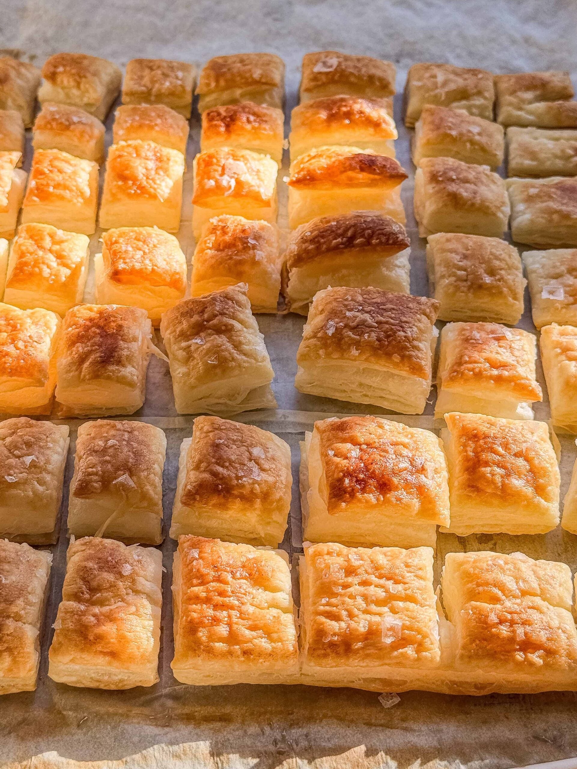 Close up of flaky, buttery puff pastry croutons fresh from the oven