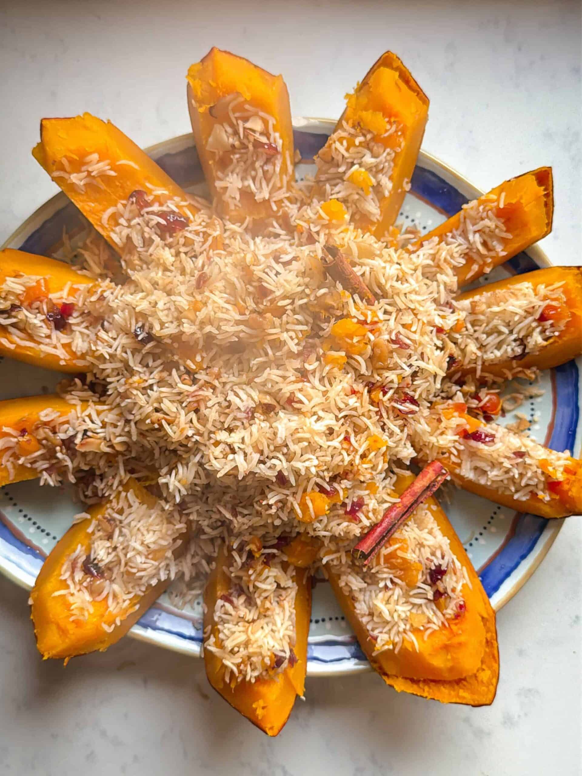 Ghapama cut into wedges and arranged in a sunburst with the rice filling in the center