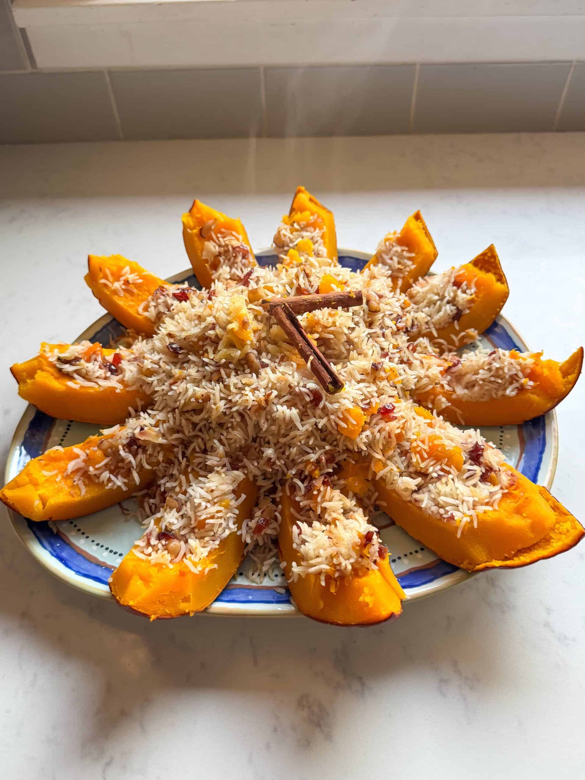 Ghapama cut into wedges and arranged in a sunburst with the rice filling in the center